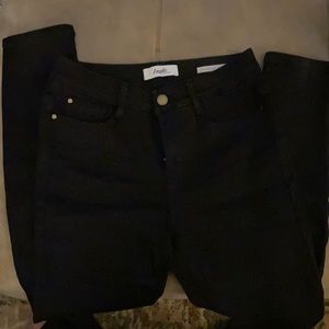 Black skinny jeans with 360 sculpt.